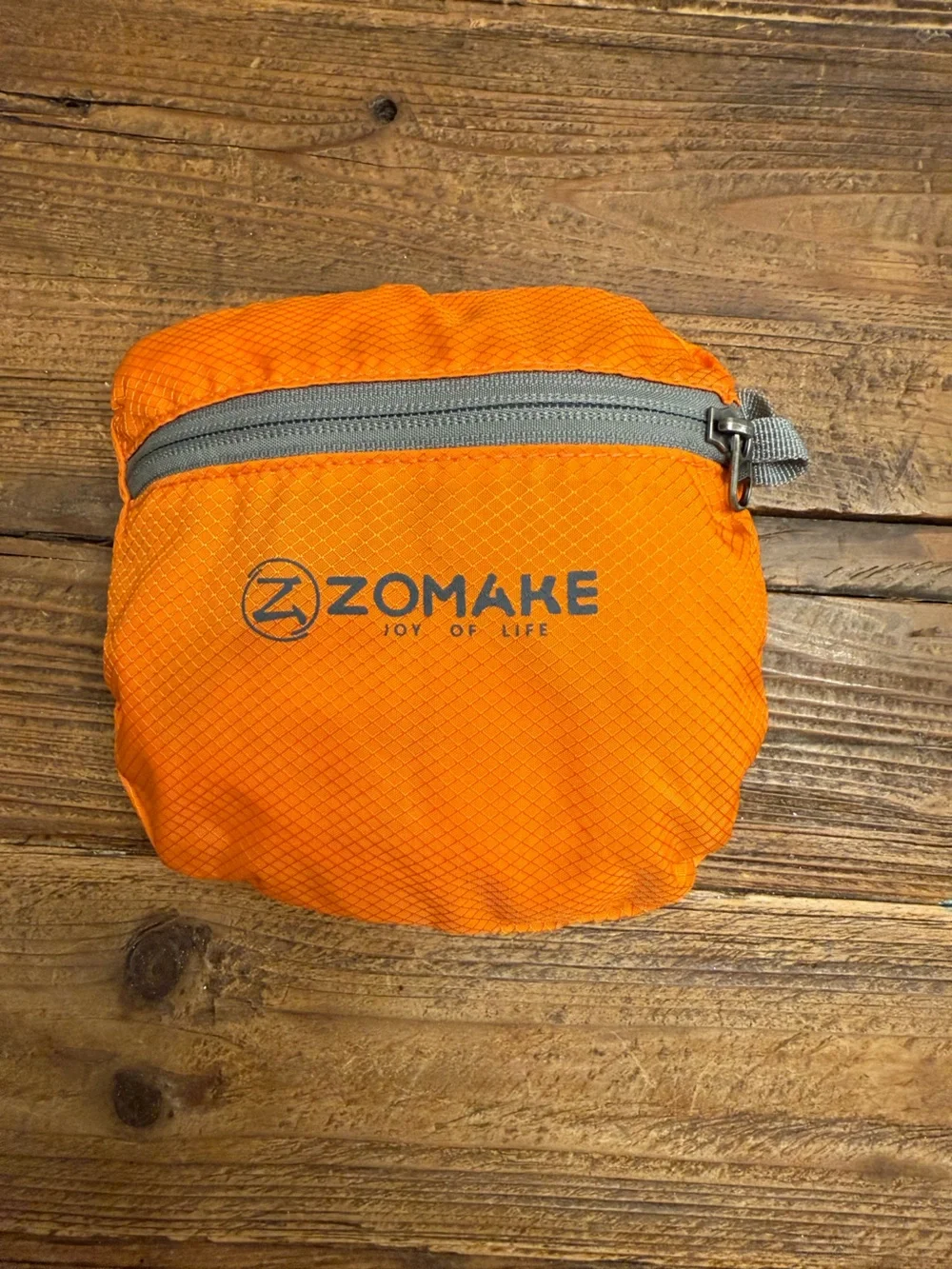 A33 -Compact Orange Packable Men's Backpack